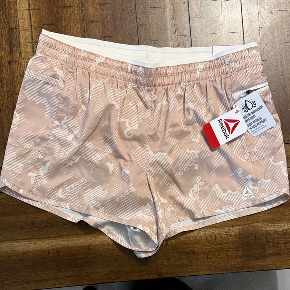 Reebok Women's Light Pink Patterned Athletic Shorts - Picture 1 of 3